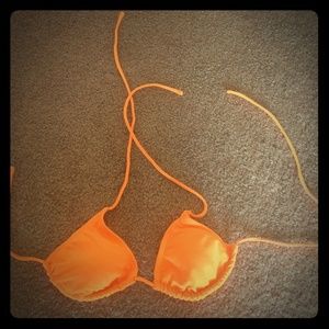Brand new size.medium tie up neon orange bra